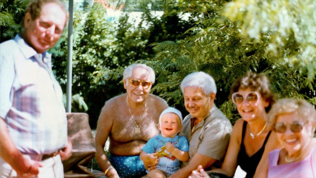 Roman Blum, shirtless, at a birthday party on Long Island in 1983